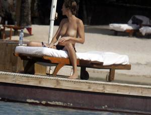 mauritius naked beach - ... little topless sunbathing at the beach last week. So you now get see  this gorgeous woman baring her even more gorgeous big tits in these photos.  Enjoy!