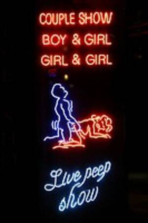 live sex peep show - Neon lights of the Sex Palace porn shop and sex show theatre showing a  couple having sex in a live..., Stock Photo, Picture And Rights Managed  Image. Pic. Z8Z-2543227 | agefotostock