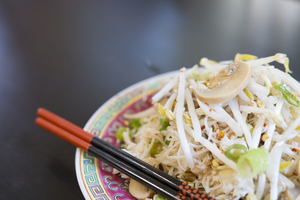 demonstrates chopsticks - Chinese style Crab Noodle Salad - Kravings Food Adventures