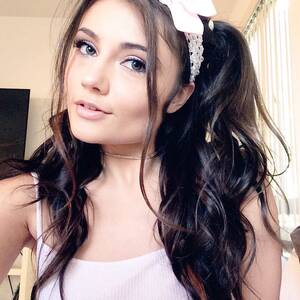 New Porn Stars 2014 18 - 1 - Adria Rae wearing a pink shirt and a bow in her hair - Hottest. Top Ten  Porn ...