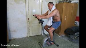 exercise bike - Photo number 2 from Muscle Hunk Handcuffed To His Exercise Bike And Made To  Cum shot