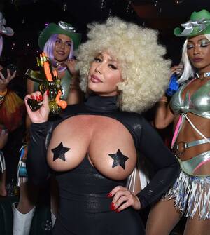 Halloween Celebrity Porn - Celebrities Naked for Halloween â€” Racy Costumes Worn by Stars | Life & Style
