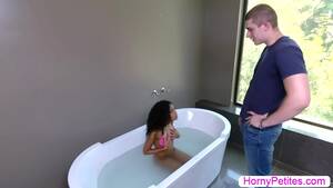 hot tub bath wet pussy black porn - Petite ebony is on the bathtub rubbing her tight wet pussy and after  that,she fucks her pussy using a huge dildo.Suddenly,her stepbrother caught  her doing that and he takes some pictures.After that,instead