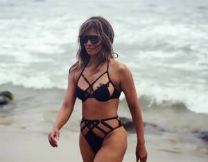 Halle Berry Celebrity Black Pussy - Halle Berry flaunts her fit figure in revealing cut-out bikini on the beach  after celebrating her 54th birthday | The US Sun