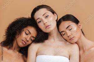 black and asian girl nude - Beauty portrait of three nude multiracial women: caucasian, african american  and asian girls, posing together isolated over beige background Stock Photo  | Adobe Stock