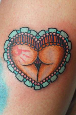 Heart Tattoo Porn - Spanking is not only trendy in mommy porn 50 shades of Grey... Tattoo
