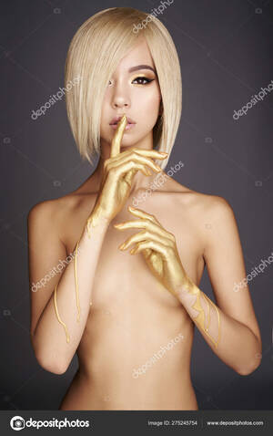 hand naked asian babes - Elegant nude asian woman with gold flowing down her hands Stock Photo by  Â©egorrr 275245754