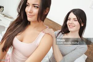 Massage Lesbian Porn - Lesbian Couple In Bedroom At Home Sitting One Girl Doing Massage To Another  Cheerful Closeup Stock Photo - Download Image Now - iStock