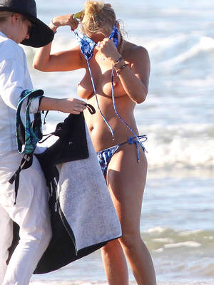australian topless beach models - Lara Bingle Topless Candids While Changing Bikinis During Bikini Photoshoot  On The Beach