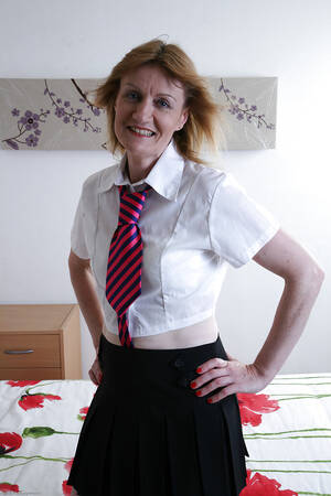 Mature Uniform Porn - Lecherous mature slut in sexy school uniform undressing and teasing her  twat - HD Porn Pictures