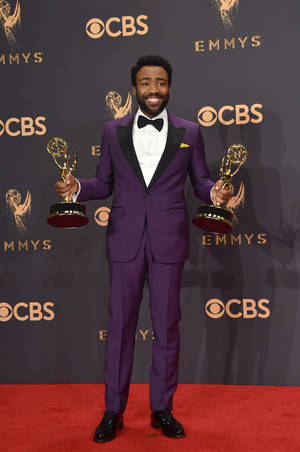 Donald Glover Porn - Emmy Awards 2017: Donald Glover Worked a Purple Gucci Tux, Which is Now a