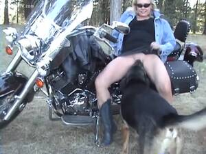 homemade biker chick porn - Bestiality Homemade - Leather clad biker MILF getting some dog dick while  out on the road - LuxureTV