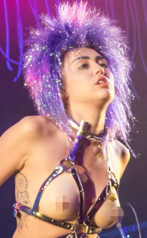 Miley Cyrus Nude Xxx - Photos from Miley Cyrus' Wildest Concert Pics