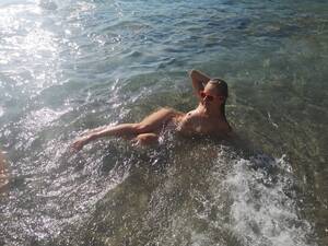 fkk nudist beach gallery - File:Naked woman at the naturist beach.jpg - Wikimedia Commons