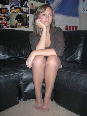 candid pantyhose legs feet - Feeling drained after another day's work, Kelly slipped off her shoes and  sat down on the sofa in her nyloned feet. This career stuff wan't all it  was ...