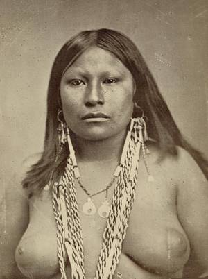 native american nudes - A naked squaw with lots of bling.