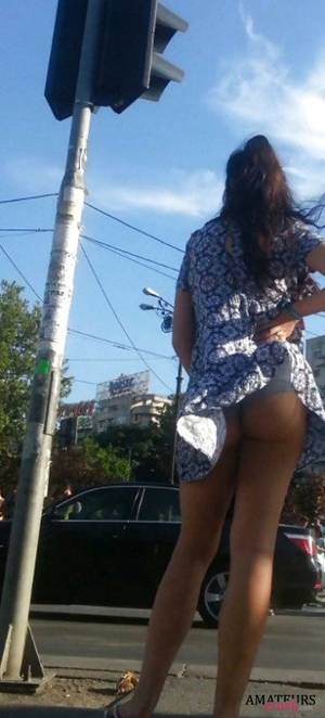 booty upskirt in public - accidental upskirt caused by wind showing her amateur tight ass in public