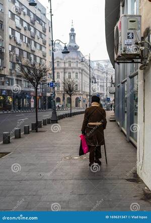 Bucharest Hotel - Person Walking on the Sidewalk, Winter Morning in Bucharest, Romania, 2020  Editorial Photography - Image of people, blur: 169631347