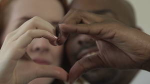 close up interracial kiss - A close-up of an interracial couple - a black man and a white woman