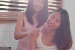 Massage Lesbian Porn - Asian Lesbian lgbtq women couple massage each other at home., People Stock  Footage ft. 4k & asian - Envato Elements
