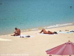 hot nude beach sunbathing - Two detained for swimming, sunbathing in the nude[4]|chinadaily.com.cn