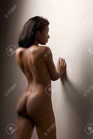 naked latinas standing - Nude young dark skinned sensuality charged Latina female with perfectly  shaped ass standing leaning on wall