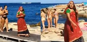 nude beach couples naked - Indian Woman goes for Beach Stroll in Saree | DESIblitz