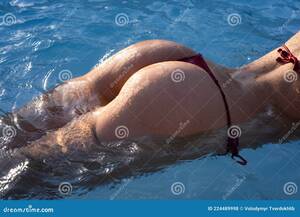 butt nude beach anal - Summer Vacation. Woman Buttocks. Girl in Bikini on Sea Water Background  with Copyspace. Buttocks. Stock Photo - Image of bikini, nude: 224489998