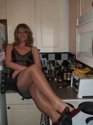 local milf - A woman always looks good in the kitchen but this horny milf has taken it up