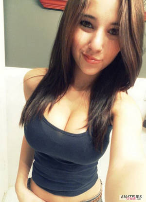 busty and petite brunette - selfie of busty petite in tight shirt
