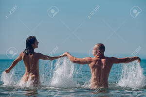 free beach vacation nude - Couple In Love Relax Nude On Beach. Summer Holidays And Paradise Travel  Vacation. Love Relations Of Naked Couple In Sea Water. Stock Photo, Picture  and Royalty Free Image. Image 167869475.