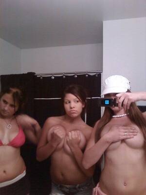 group nude self - 3 teens take topless self shot pics together
