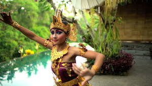 dance native american indians nude - Balinese female artistic dancer performing in ceremonial traditional  colorful costume using hands and fingers Indonesia South