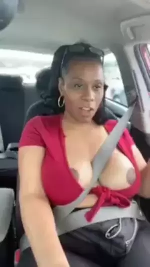 ebony boob flash - Solo ebony Desiree Desire flashes her tits while driving | xHamster