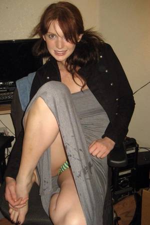 everyday upskirt - Her skirt is wet in some parts.