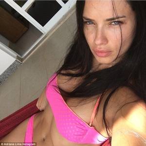 Brazil Porn Adriana Lima - Angelic: Adriana Lima, 35, posed for a sultry selfie from her Brazilian  vacation