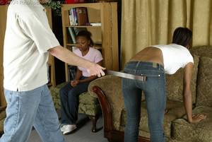african girls spanking - punished_with_the_belt1.jpg