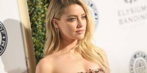 Amber Heard Porn Double - Amber Heard is suing London Fields producer over body double being used for  explicit sex scenes