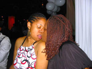 black teen girl kissing - Young African American high school girls kissing in front of the camera |  Picture #5