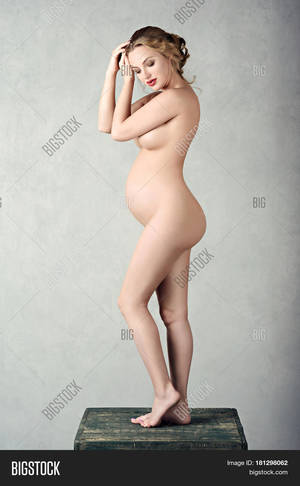 model pregnant nude - Closeup beautiful pregnant nude lady in elegant pose isolated on white  background. Portrait of sexy