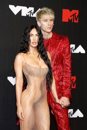 Model Megan Fox Porn - Naked Megan Fox Points a Gun at Machine Gun Kelly's Crotch in First Joint  Magazine Cover | Glamour