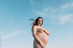 blue pregnant lady naked - Naked Pregnant Woman On Blue Sky\