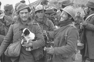 Civil War Prostitute Porn - The writer George Orwell poses with the puppy during the Spanish Civil War.  Behind him