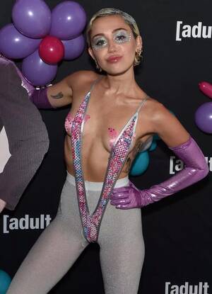 Big Boobs Porn Miley Cyrus - Miley Cyrus rocks three risquÃ© boob-baring outfits in one night - Mirror  Online
