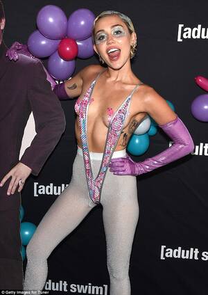 Mature Pussy Miley Cyrus - Miley Cyrus fails to protect her modesty as she shows off her butterfly  nipple pasties under a daring monokini ensemble at the Adult Swim Upfront  Party | Daily Mail Online