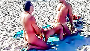 mmf beach sex - Public MMF threesome on a beach | voyeurstyle.com