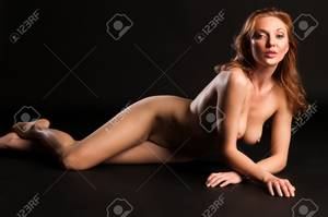 blonde naked black - Beautiful tall nude blonde on a black background Stock Photo - 13091268