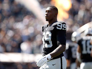 Aldon Porn - watch child porn online OAKLAND, CA - SEPTEMBER 20: Aldon Smith #99 of the  Oakland Raiders stands on the field before their game against the Baltimore  ...