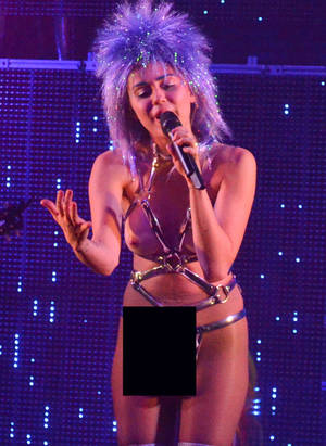 Miley Cyrus Strapon Porn - Miley Cyrus performing with dildo