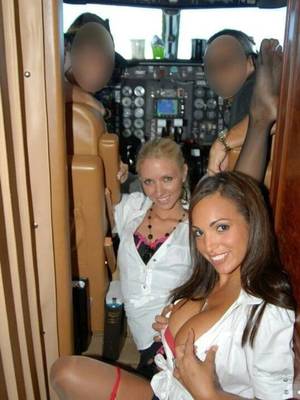 air stewardess - Saucy snaps of naughty air stewardesses stripping off in cockpits and even  performing sex acts have been released. The shocking images, found by  Polish ...